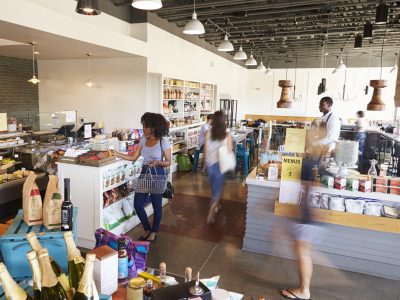 Interior Of Busy Delicatessen With Customers